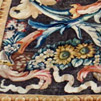 Conservation restauration d'un tapis tissé sous le règne de Louis XIV, entre 1670 et 1685, à la manufacture de la Savonnerie et destiné à garnir le plancher de la Grande Galerie du Louvre.